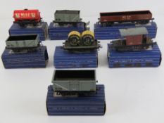 A quantity of Hornby Dublo 00 gauge wagons including oil wagon, open wagon, mineral wagon,