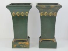 A pair of contemporary planters standing 31.5cm high.