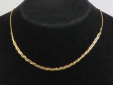 A 9ct gold part-plaited 's' link chain necklace, hallmarked 375 and measuring 41.5cm in length.