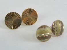 A pair of 9ct gold stud earrings of circular form, hallmarked 375, 2.1g.