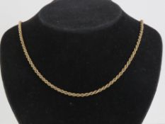 A 9ct gold rope twist chain necklace, hallmarked 375 and measuring 45.5cm in length, 4g.