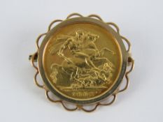 A 22ct gold full sovereign, 1902 Edward VII, 8g, in 9ct gold pendant mount. Total weight 10.5g.
