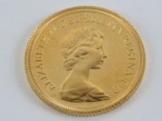 A Royal Mint 22ct gold full sovereign, Elizabeth II 1979, 8g. In original presentation packaging.