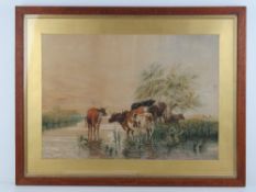 Watercolour; cattle grazing in a water meadow, river, willow tree and buildings beyond etc,