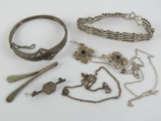 A quantity of silver jewellery including hinged bangle, two chains, gate link bracelet,