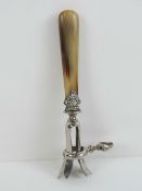 A late 19th / early 20th century French silver plate and horn manche a gigot (ham bone holder) with