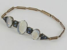 A finely made Art Deco moonstone and blue sapphire bracelet,