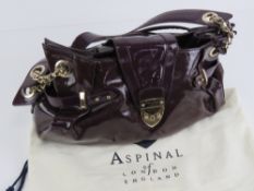 Aspinal of London; a purple patent leather handbag, 36cm wide,