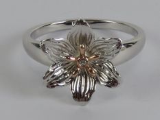 A Clogau silver ring in flower design with central diamond set in Welsh rose gold, hallmarked 925,