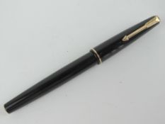 A vintage Parker 17 fountain pen having yellow metal nib.