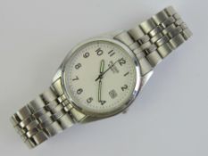 A Pulsar stainless steel wristwatch with original instructions booklet,