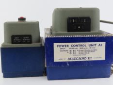 A Meccano power control unit K3 in original box together with a Hornby Dublo C3 controller,