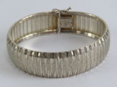 A HM silver articulated panel bracelet,