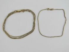 A 9ct gold tri colour three chain bracelet, hallmarked 375 and measuring 19cm in length,