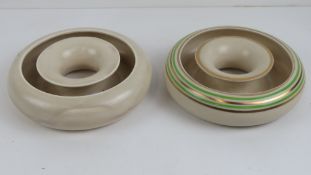Two Clarice Cliff posy rings each 18cm diameter.