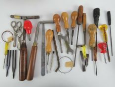 A quantity of vintage piano tuners tools and implements including tuning wrenches (various sizes)