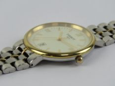 A stainless steel Tissot wristwatch having cream dial,