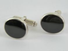 A pair of 925 silver and black enamel cuff links.