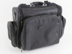 A black leather Mulberry laptop/travel bag having extending pull along handle and various pockets