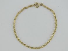 To match above Lot; A 9ct gold faceted oval link chain bracelet measuring 18.