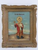 Russian School; oil on board, a portrait of St Nicholas in iconographic form within recessed frame,