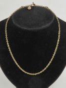 A 9ct gold chain necklace having T-bar clasp with heart pendant upon, hallmarked 375,