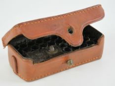 A leather carry case for .44 cal rounds.