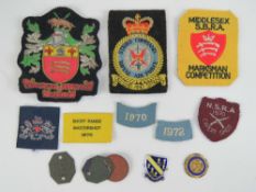 A gilt and silvered thread embroidered c