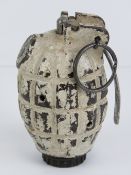 An inert 1944 Mills 36 training grenade.