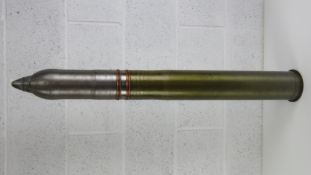 An inert WWII German 105mm Naval SK C/32 'Admiral Scheer' round,