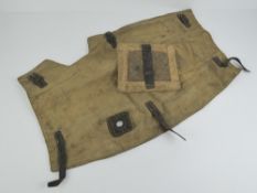 A MG34 breech cover and 'asbestos' heat proof mitt.
