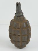 An inert WWI/WWII French F1 grenade.