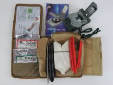 A British E.O.D clearing kit and survival compass.