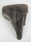 A WWII German P38 leather holster having German marks upon.