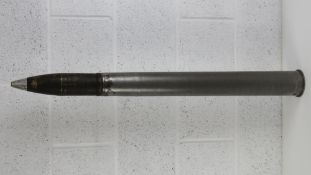 An inert WWII German 7.5cm Pak 40 HE Round, shell and fuse having German marks upon and dated 1944.