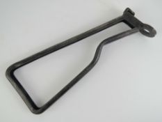 A Sten MK 2 skeleton stock.