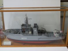 An Impressive model of HMS Arun River Class Fleet Minesweeper within glazed oak case.