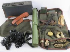A quantity of assorted MG42 accessories including gunners kit, spare barrel case, cleaning rod,