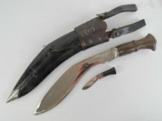 A standard issue WWII Nepalese Gurkha kukri (khukuri) having sheath with belt loops,
