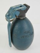 An inert L56 training grenade with fuse and pin, dated 1996.