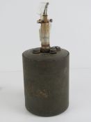 An inert WWII German S mine with fuse and prongs.