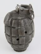 An inert 1940 Mills 36 training grenade.