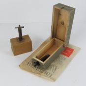 An inert WWII German wooden mine dated 1938.