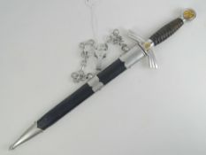 A replica WWII German Luftwaffe Second Pattern dagger, with scabbard and hanger,