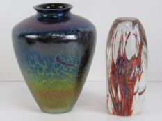 A faceted glass paperweight in the style