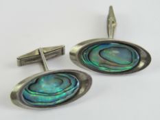 A pair of sterling silver and abalone sh