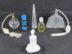 A quantity of vintage perfume bottles in