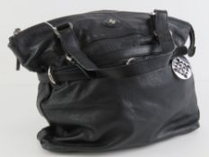 A black leather Patrick Cox tote handbag