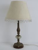 An onyx and brass lamp base complete wit