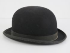 A Lock & Co London felt bowler hat, size 7 1/4.